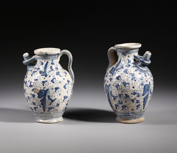 MANIFATTURA DI MONTELUPO DEL XVII SECOLO : Due orcioli in maiolica policroma di forma ovoidale e versatoio a tubetto, decoro a foglie di quercia in azzurro  - Asta Asta 379 | ARTE ANTICA E DEL XIX SECOLO - Dipinti antichi e antiquariato  Online - Associazione Nazionale - Case d'Asta italiane
