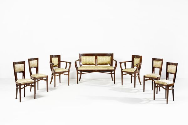 MANIFATTURA DEGLI INIZI DEL XX SECOLO : Salotto di gusto Deco composto da un divanetto, due poltrone e quattro sedie in legno intagliato con applicazioni in bronzo, schienali e sedute rivestiti di tessuto a decorazioni floreali  - Asta Asta 379 | ARTE ANTICA E DEL XIX SECOLO - Dipinti antichi e antiquariato  Online - Associazione Nazionale - Case d'Asta italiane