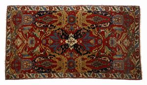 ANATOLIA - Tappeto a campo rosso e azzurro con decorazioni fitomorfe e animali