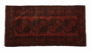TAPPETO AFGANO - Tappeto a decorazione geometrica, inizio XX secolo
