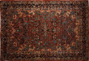 MANIFATTURA PERSIANA DEL XX SECOLO - Tappeto Saruk, campo rosa con decoro floreale e bordura con foglie e fiori