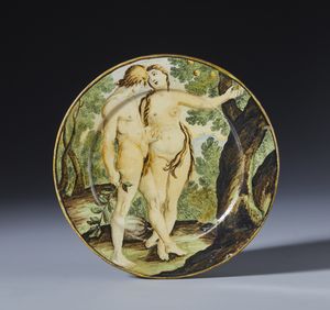 CASTELLI D'ABRUZZO, XVIII SECOLO - Piccolo piattto in maiolica policroma raffigurante Adamo ed Eva nel giardino dell'Eden