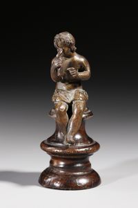BRONZISTA DELL'ITALIA SETTENTRIONALE DEL XVI-XVII SECOLO - Figura di fanciullo seduto