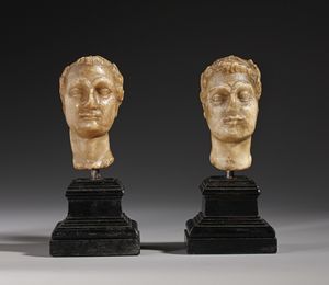 MANIFATTURA ROMANA DEL XVII SECOLO - Coppia di teste in marmo raffiguranti imperatori