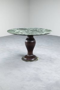 DASSI - Tavolo rotondo con struttura in legno tornito   base e piano in marmo verde Alpi. Anni '50  cm 75x110