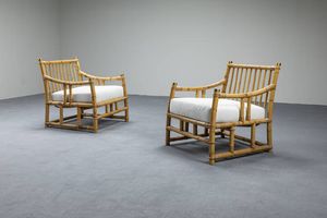 VIVAI DEL SUD - Coppia di poltrone con struttura in bamboo  particolari in ottone  cuscino imbottito rivestito in tessuto. Anni  [..]