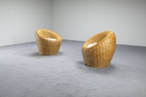 PRODUZIONE ITALIANA - Coppia di poltrone con struttura in vimini intrecciato. Anni '70  cm 80x80x70