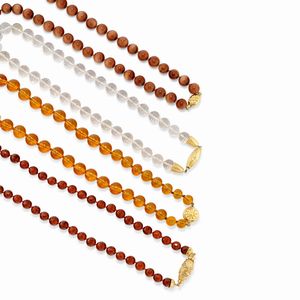 Quattro collane in oro giallo 18k e pietre dure colorate  - Asta Argenti dal XVIII al XX secolo - Associazione Nazionale - Case d'Asta italiane