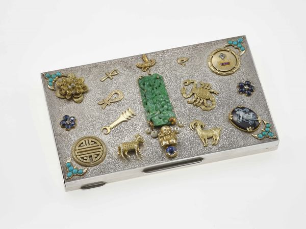 Orisa. Trousse con applicazioni porte bonheur  - Asta Fine jewels - Associazione Nazionale - Case d'Asta italiane