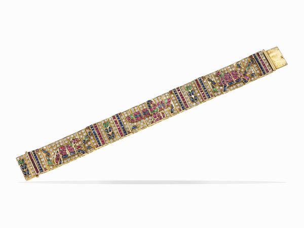 Bracciale Retour d'Egypte con diamanti, rubini, zaffiri e smeraldi taglio cabochon  - Asta Fine jewels - Associazione Nazionale - Case d'Asta italiane