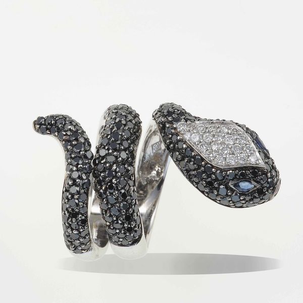Anello serpente con pav di diamanti neri e bianchi  - Asta Fine jewels - Associazione Nazionale - Case d'Asta italiane