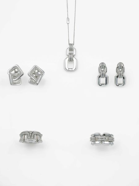 Modelli Link Febo e Link Diana. Lotto composto da due pendenti, due paia di orecchini e tre anelli con diamanti  - Asta Gioielli Contemporanei - Associazione Nazionale - Case d'Asta italiane