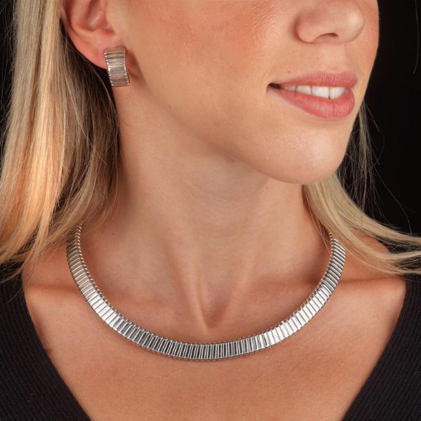 BULGARI PARURE MOTIVO FLOREALE CON RUBINI E DIAMANTI  - Asta Gioielli - Associazione Nazionale - Case d'Asta italiane