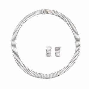 BULGARI PARURE MOTIVO FLOREALE CON RUBINI E DIAMANTI  - Asta Gioielli - Associazione Nazionale - Case d'Asta italiane