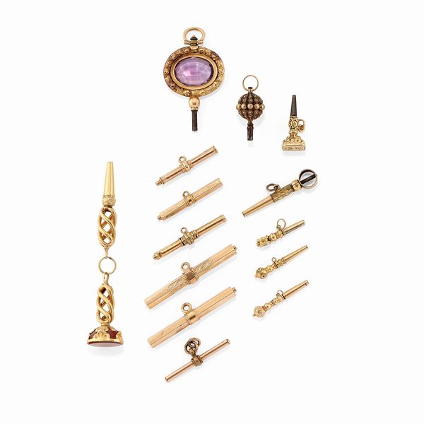 Quattordici chiavette da orologio in oro giallo e rosso 18K  - Asta Gioielli - Associazione Nazionale - Case d'Asta italiane