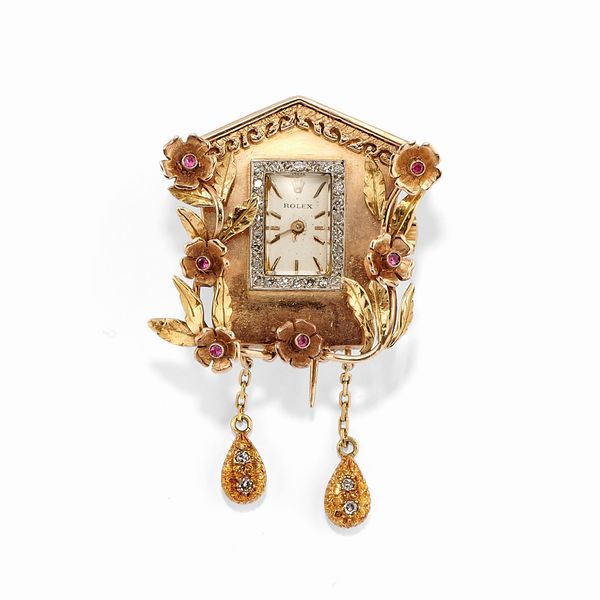 Spilla-orologio in oro bicolore 18k, diamanti e rubini  - Asta Gioielli - Associazione Nazionale - Case d'Asta italiane