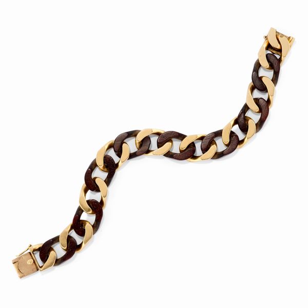 Van Cleef & Arpels : Bracciale in oro giallo 18k e legno  - Asta Gioielli - Associazione Nazionale - Case d'Asta italiane