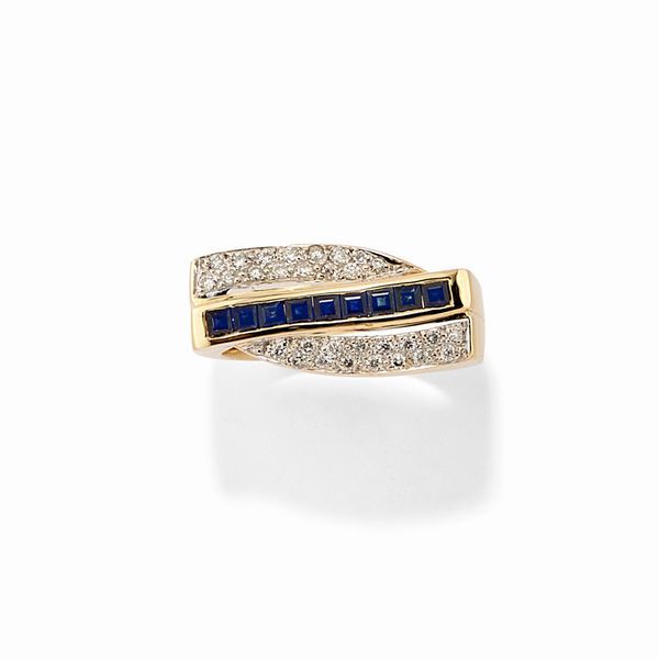 Anello in oro bicolore 18k, diamanti e zaffiri  - Asta Gioielli - Associazione Nazionale - Case d'Asta italiane