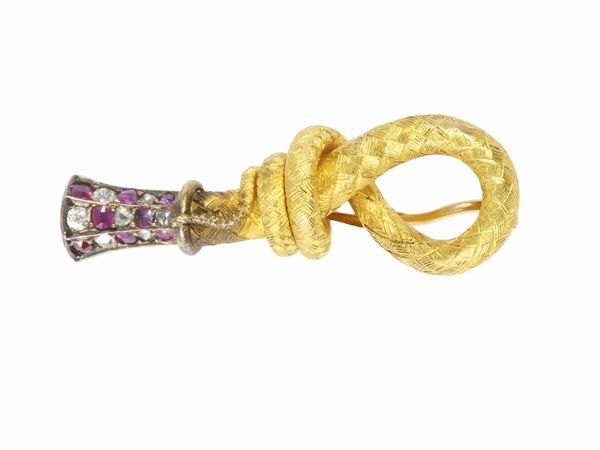Spilla in oro giallo con diamanti e rubini  - Asta Gioielli e Orologi - Associazione Nazionale - Case d'Asta italiane