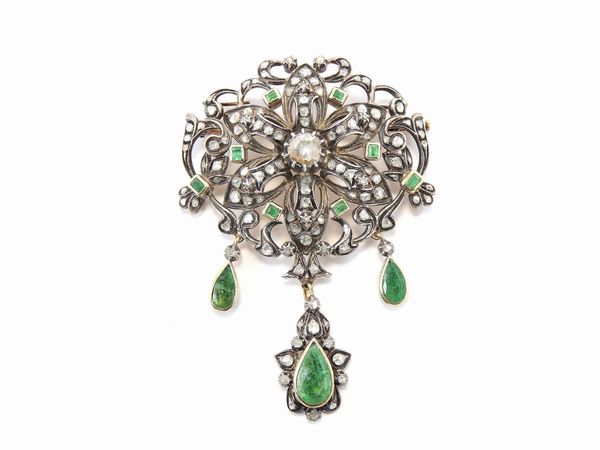 Spilla in oro giallo e argento con diamanti e smeraldi  - Asta Gioielli e Orologi - Associazione Nazionale - Case d'Asta italiane