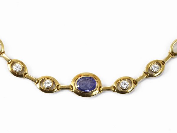 Girocollo in oro giallo con diamanti e intaglio su zaffiro  - Asta Gioielli e Orologi - Associazione Nazionale - Case d'Asta italiane