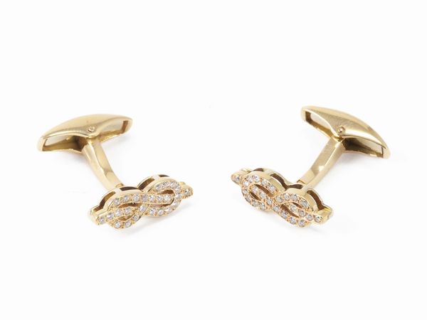 Gemelli in oro giallo con diamanti  - Asta Gioielli e Orologi - Associazione Nazionale - Case d'Asta italiane