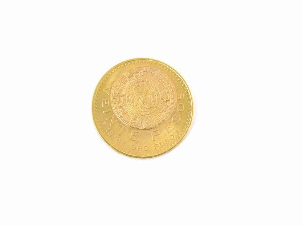 Una moneta da 20 Pesos  - Asta Gioielli e Orologi - Associazione Nazionale - Case d'Asta italiane