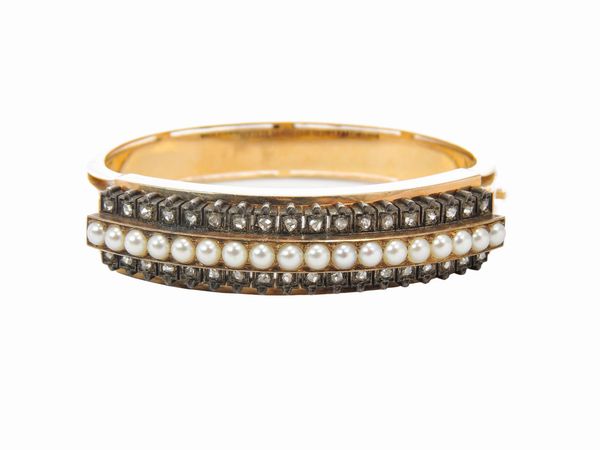 Bracciale rigido in oro rosa e argento con diamanti e perle coltivate  - Asta Gioielli e Orologi - Associazione Nazionale - Case d'Asta italiane