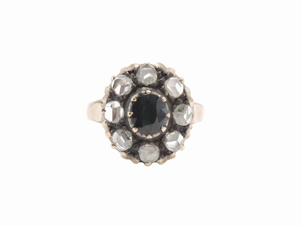 Anello a margherita in oro rosa 500/1000 e argento con diamanti e zaffiro  - Asta Gioielli e Orologi - Associazione Nazionale - Case d'Asta italiane