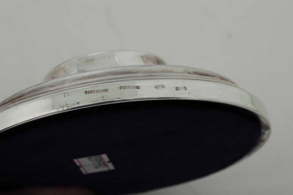 Insieme di sette portacandele in argento 925 e un portacero in argento 800  - Asta Dimore italiane | Cambi Time - Associazione Nazionale - Case d'Asta italiane