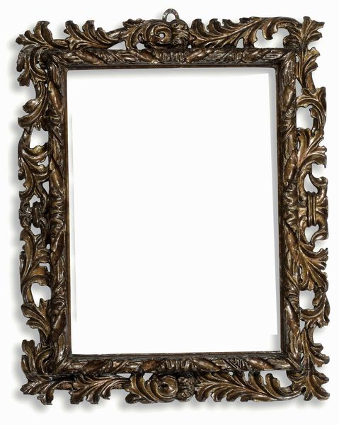 Cornice a cartoccio in legno intagliato e a mecca . Emilia XVII secolo  - Asta Cornici antiche - Associazione Nazionale - Case d'Asta italiane