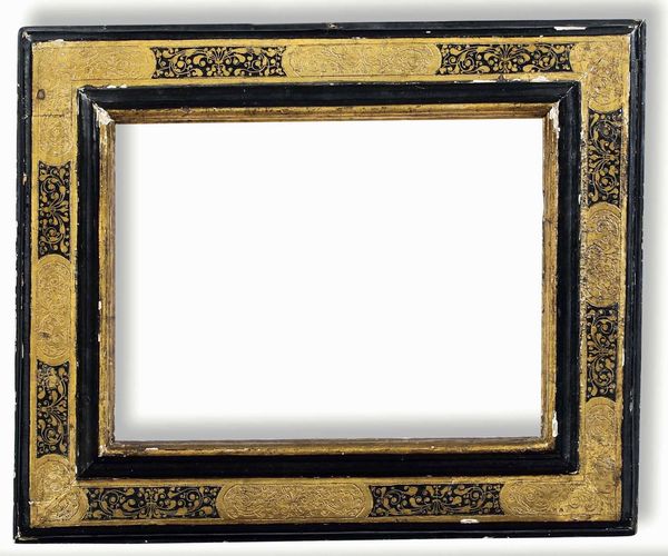 Cornice a cassetta in legno ebanizzato, dorato e bulinato. Toscana XVII secolo  - Asta Cornici antiche - Associazione Nazionale - Case d'Asta italiane
