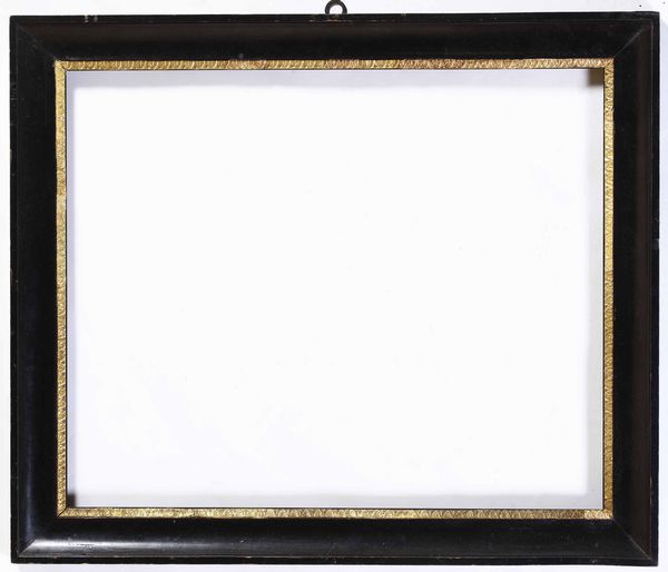 Cornice neoclassica in legno ebanizzato con decoro a fogliette in pastiglia dorata, XIX secolo  - Asta Cornici antiche - Associazione Nazionale - Case d'Asta italiane