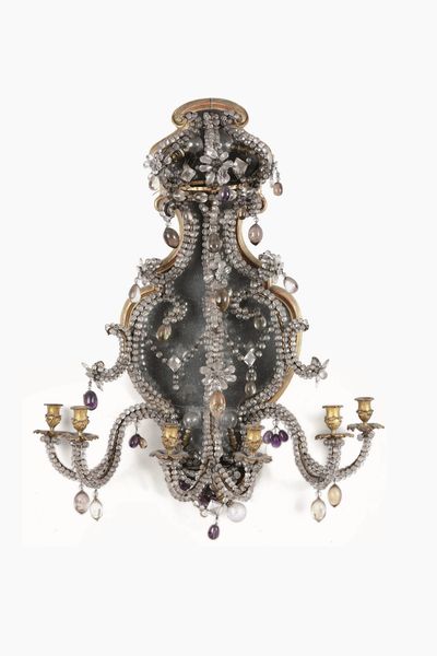 Coppia di grandi lumiere da parete a quattro luci in cristallo di Rocca, quarzo viola, ametista e citrini. Piemonte, XVIII secolo  - Asta Dimore italiane - Associazione Nazionale - Case d'Asta italiane