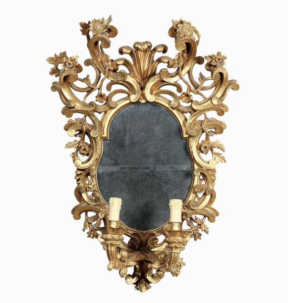 Coppia di specchiere in legno intagliato, traforato e dorato. Toscana XVII-XVIII secolo  - Asta Dimore italiane - Associazione Nazionale - Case d'Asta italiane