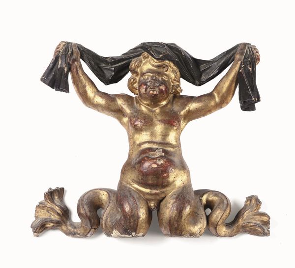 Putto bicaudato. Legno scolpito, dipinto e dorato. Arte barocca italiana del XVII-XVIII secolo  - Asta Dimore italiane - Associazione Nazionale - Case d'Asta italiane