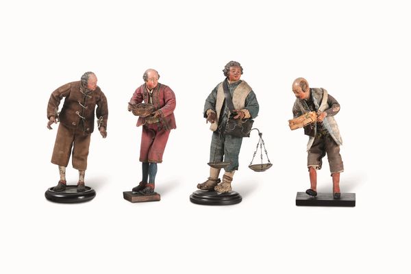 Quattro figure da presepe raffiguranti mercanti. Napoli, fine XVIII - inizio XIX secolo  - Asta Dimore italiane - Associazione Nazionale - Case d'Asta italiane