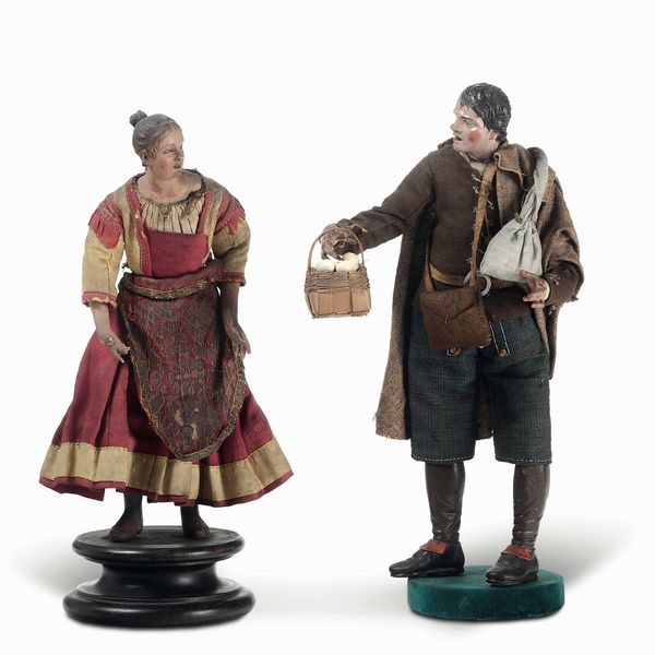Due figure da presepe. Venditore di uova e figura femminile. Napoli, fine XVIII - inizio XIX secolo  - Asta Dimore italiane - Associazione Nazionale - Case d'Asta italiane