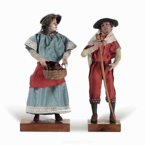 Due figure da presepe raffiguranti mercanti. Napoli, inizio XIX secolo  - Asta Dimore italiane - Associazione Nazionale - Case d'Asta italiane