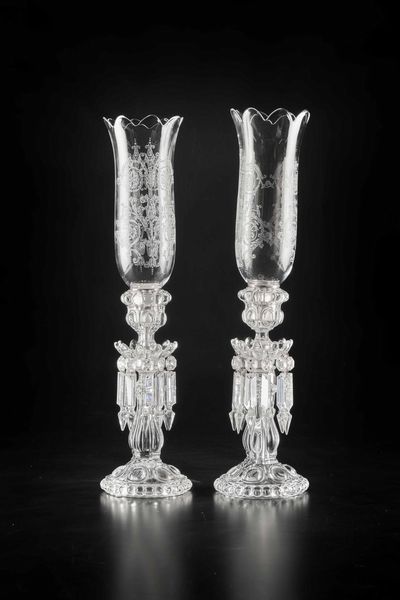 Coppia di candelieri<BR>Francia, Manifattura Baccarat, XX secolo<BR>  - Asta L'art de la table - Associazione Nazionale - Case d'Asta italiane