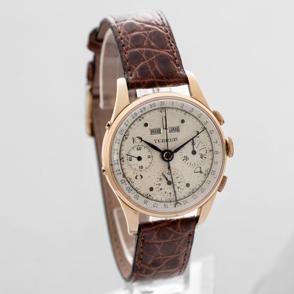 TERIAM - Dato Compax in oro giallo 18k, cronografo tre contatori tasti quadri, triplo calendario, quadrante Argent�, movimento a carica manuale  - Asta Orologio da polso e da tasca  - Associazione Nazionale - Case d'Asta italiane