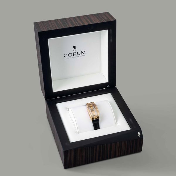 CORUM - Golden Bridge in oro rosa 18k con pav� di brillanti, movimento a vista disposto su ponte verticale a carica manuale, mai indossato con scatola e garanzia  - Asta Orologio da polso e da tasca  - Associazione Nazionale - Case d'Asta italiane