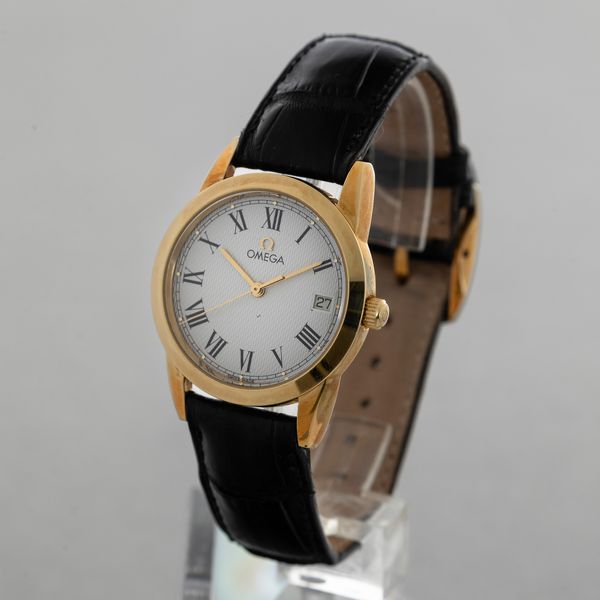 OMEGA - Louis Brandt in oro giallo 18k, quadrante bianco guiloch� con numeri Romani e datario, movimento automatico a vita e astuccio originale  - Asta Orologio da polso e da tasca  - Associazione Nazionale - Case d'Asta italiane