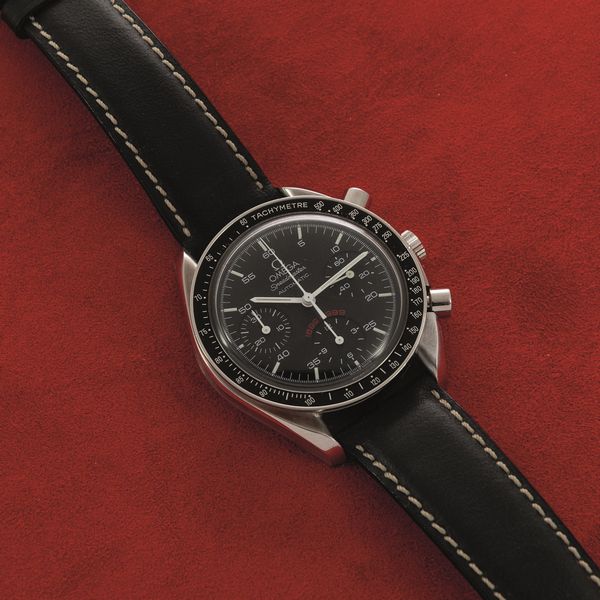 OMEGA - Speedmaster reduced automatico in acciaio realizzato per il 100 anniversario Milan. Crongrafo tre contatori con quadrante nero e data del centenario in rosso  - Asta Orologio da polso e da tasca  - Associazione Nazionale - Case d'Asta italiane