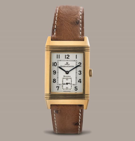 JAEGER LECOULTRE - Reverso Grand Taille, quadrante Argent� bitonale con numeri Arabi, piccoli secondi e cassa in oro 18k reversibile. Accompagnato da scatola e garanzia  - Asta Orologio da polso e da tasca  - Associazione Nazionale - Case d'Asta italiane