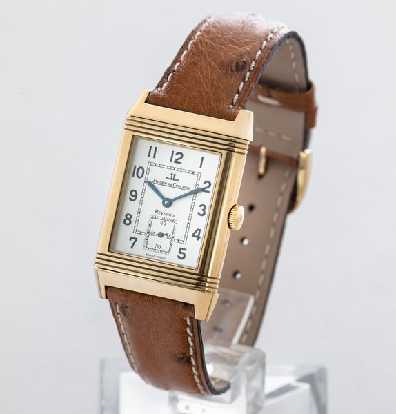 JAEGER LECOULTRE - Reverso Grand Taille, quadrante Argent� bitonale con numeri Arabi, piccoli secondi e cassa in oro 18k reversibile. Accompagnato da scatola e garanzia  - Asta Orologio da polso e da tasca  - Associazione Nazionale - Case d'Asta italiane