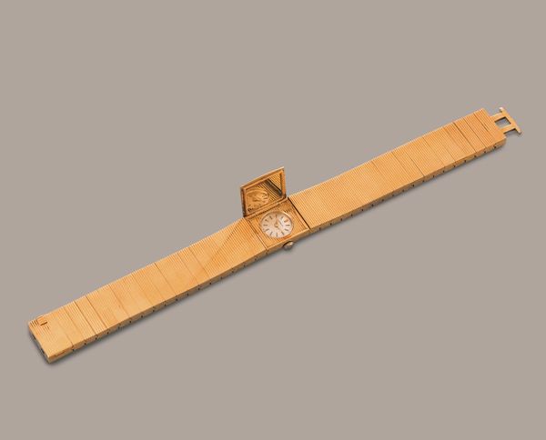 GUBELIN - Montre a Secret in oro giallo 18k con apertura laterale a pressione nascosta, quadrante argent� con indici applicati movimento a carica manuale  - Asta Orologio da polso e da tasca  - Associazione Nazionale - Case d'Asta italiane