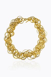HERMES - Girocollo in oro giallo  firmato Hermes  modello Rivage  composto da anelli concentrici intrecciati.  Il girocollo  [..]