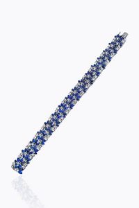 BRACCIALE - Peso gr 48 Lunghezza cm 18 in oro bianco con zaffiri taglio navette per totali ct 22 ca e diamanti taglio brillante  [..]