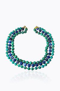 LUNGA COLLANA - Lunghezza cm 45 ca composta da due file di sfere di malachite e di lapislazzuli del diam. di mm 10. Chiusura in  [..]